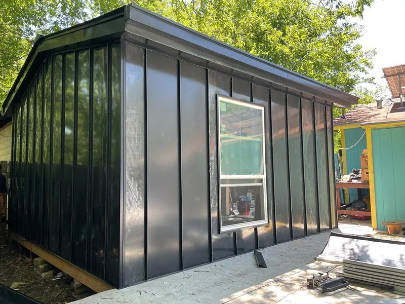 Black standing seam metal wall panels for Metal Roof Installation in Sea Cliff