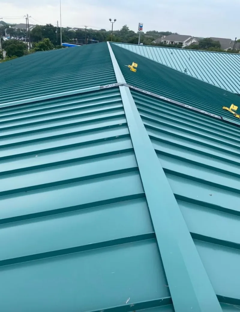 Green commercial metal roof ridge and valley for Metal Roof Repair in Sea Cliff